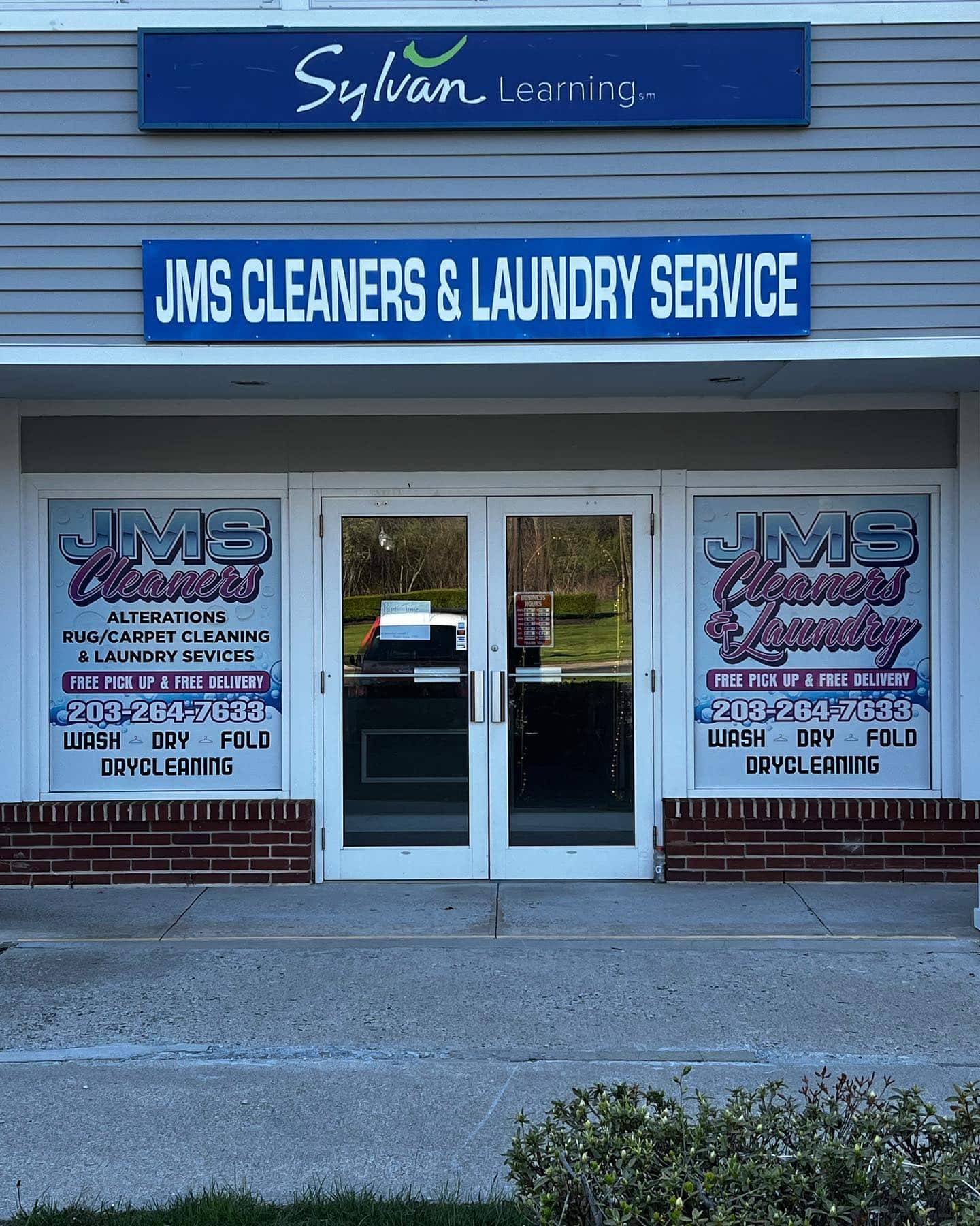 J M S Dry Cleaners & Laundry Service Sign